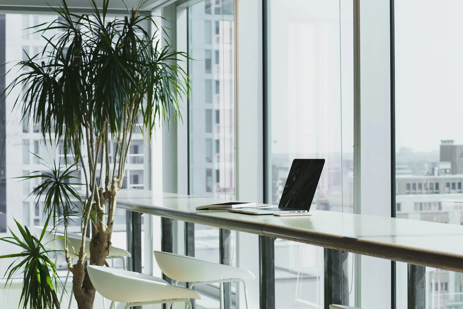 Team seated around a conference table for contract reminders and notification planning